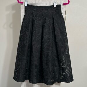 Bebe black Jacard skirt size 2
